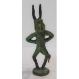 An antique pagan/erotica bronze devil figure on circular base. H.19cm