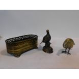 A collection of vintage brass items, grouse and partridge figures and a miniature pierced jardiniere