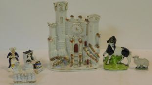A 19th century Staffordshire flatback figure of a castle, a hand painted sheep and a horse and a