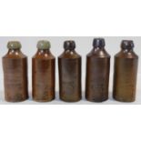 A collection of four 19th century stoneware lemonade bottles each impressed with the R. White name