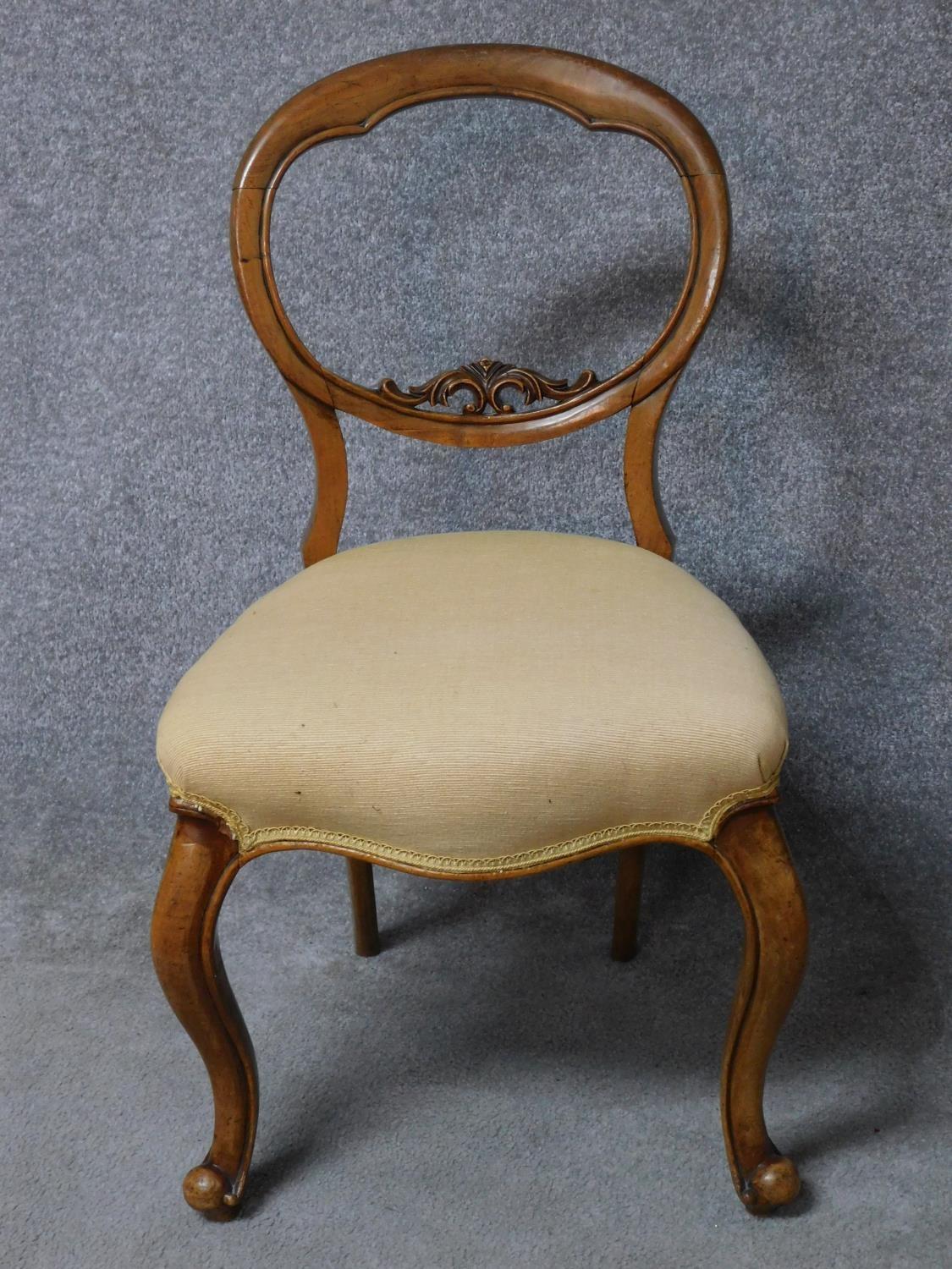 A pair of Victorian walnut balloon back dining chairs in damsk upholstery on cabriole supports. H. - Image 2 of 6