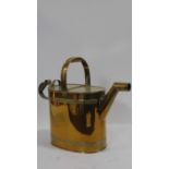 A 19th century brass watering can with makers trade mark to the base. H.43 W.53 D.21cm