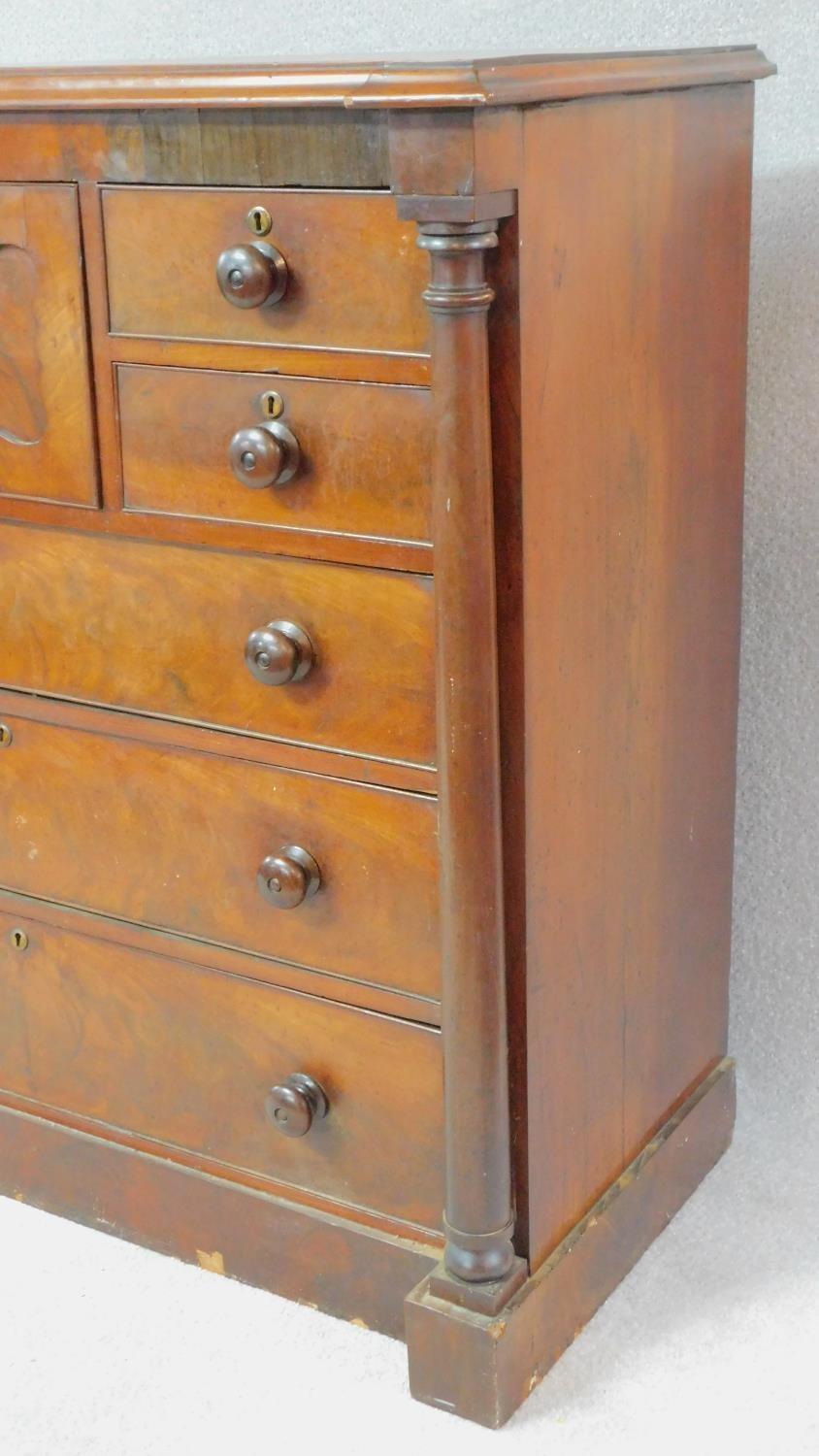 A Victorian figured mahogany chest of drawers with central hat drawer and an arrangement of seven - Image 5 of 8