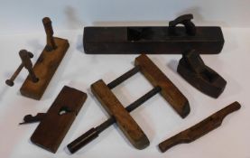 A collection of vintage block planes and clamps. 15x56cm (largest)