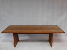 An African hardwood refectory type table with heavy planked top on block trestle supports. H.70 W.