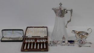 A collection of silver plated items. Including a cased set of cake forks, cut glass and silver