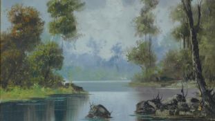 A gilt framed oil on canvas, river landscape, signed Mancini. 75x65cm