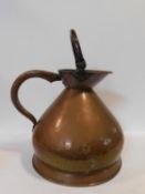 A 19th century copper four gallon brewer's jug with hinged carrying handle. 55x53cm