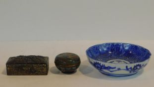 A collection of Japanese items. Including a blue and white transfer design bowl, a cloisonne