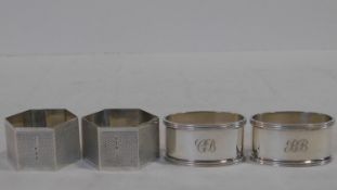 Two pairs of silver napkin rings. One oval with linear edges monogrammed with BB and CB, hallmarked: