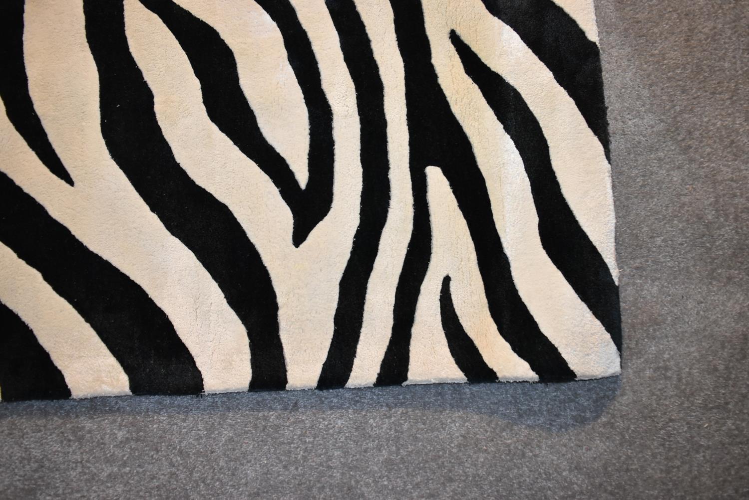 A Zebra skin patterned rug. L.274x182cm - Image 2 of 3