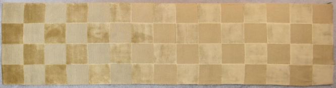 A silk and wool runner with gold and beige chequerboard design. L.360x97cm