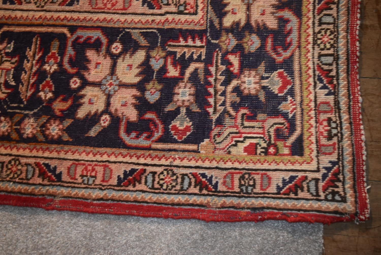 A Persian Tabriz carpet with floral central double pendant medallion surrounded by spandrels on a - Image 3 of 4
