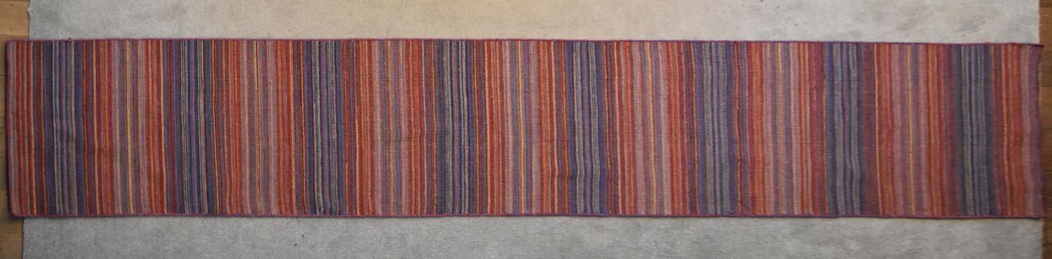 A contemporary Kilim runner with polychrome linear design. L.400x70cm