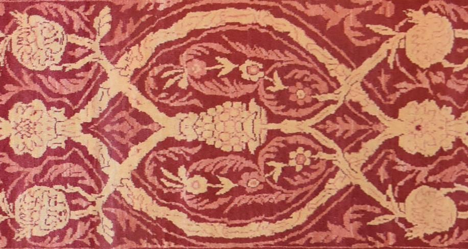 An Ottoman runner with allover scrolling vine decoration contained within a plain border. L.240x80cm - Image 2 of 4