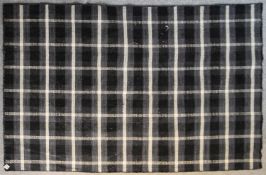 A contemporary Indian flat weave Kilim in a monochrome check pattern. H.205x140cm