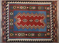 A Qashgai Kilim with central medallion on burgundy ground within multiple geometric borders. H.