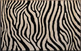 A Zebra skin patterned rug. L.274x182cm
