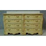 a mid century vintage cream and gilt bombe style chest of drawers fitted with an arrangement of