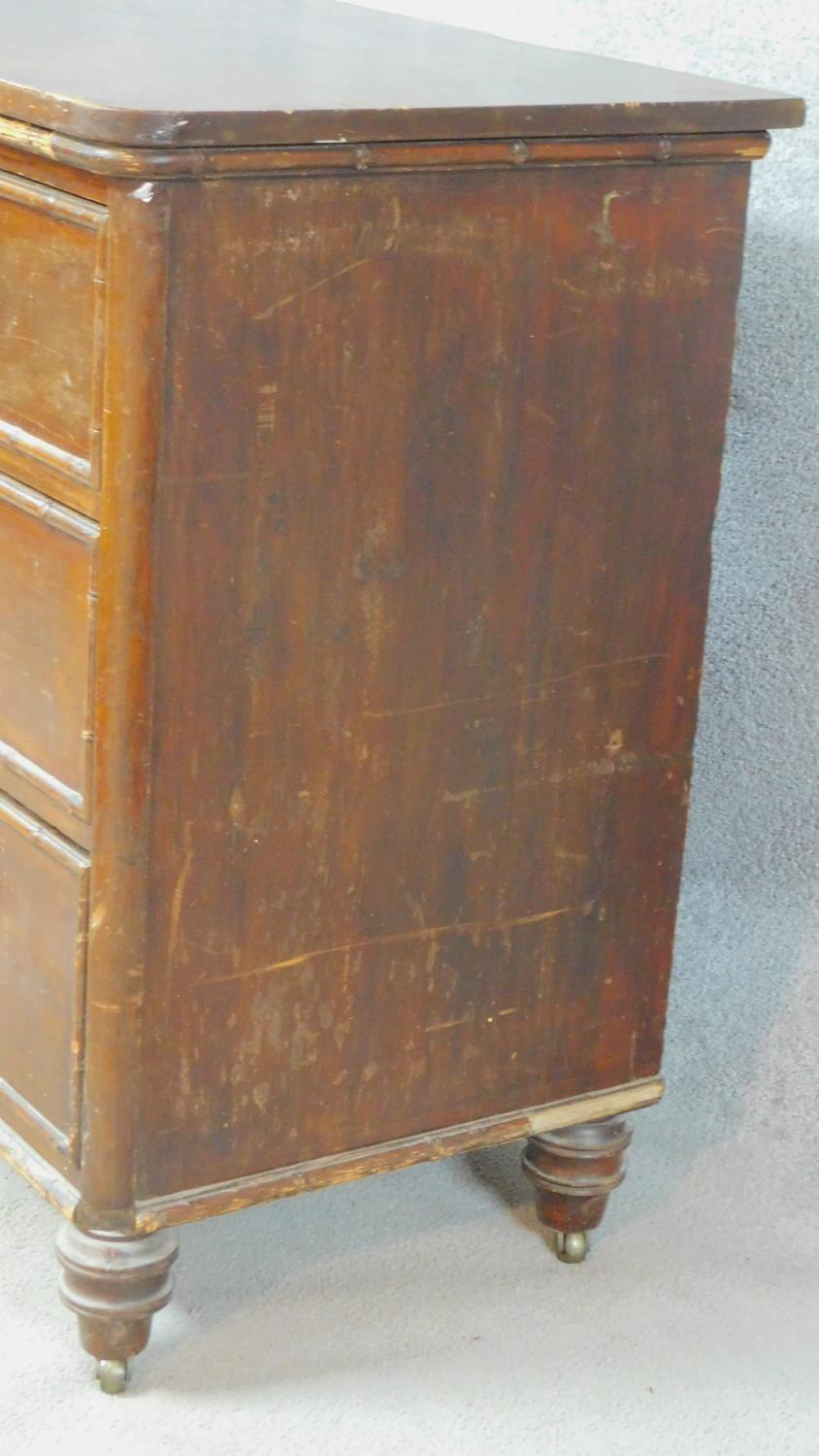 An early 19th century pitch pine chest of drawers with faux bamboo mouldings raised on squat - Image 5 of 6