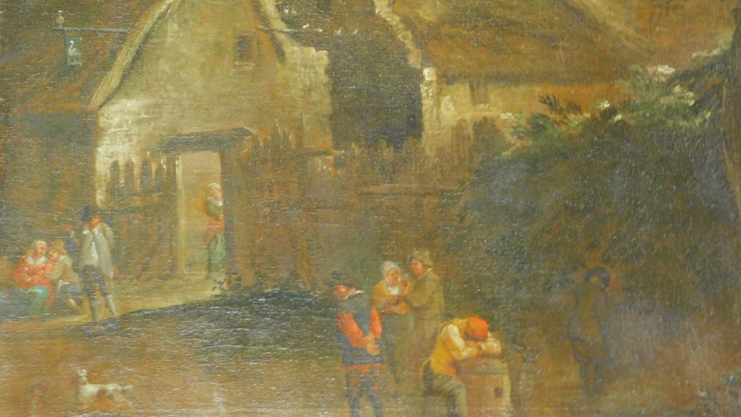 A large 19th century unframed oil on canvas, figures in a village setting, unsigned. 71x64cm