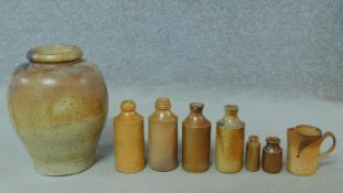 A collection of antique stoneware pieces. Including Denby and various glazed bottles, some by S
