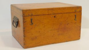 A 19th century stained pine apothecary's box with twin carrying handles and fitted interior. H.24