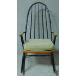 A painted beech framed Ercol style rocking chair. H.107cm