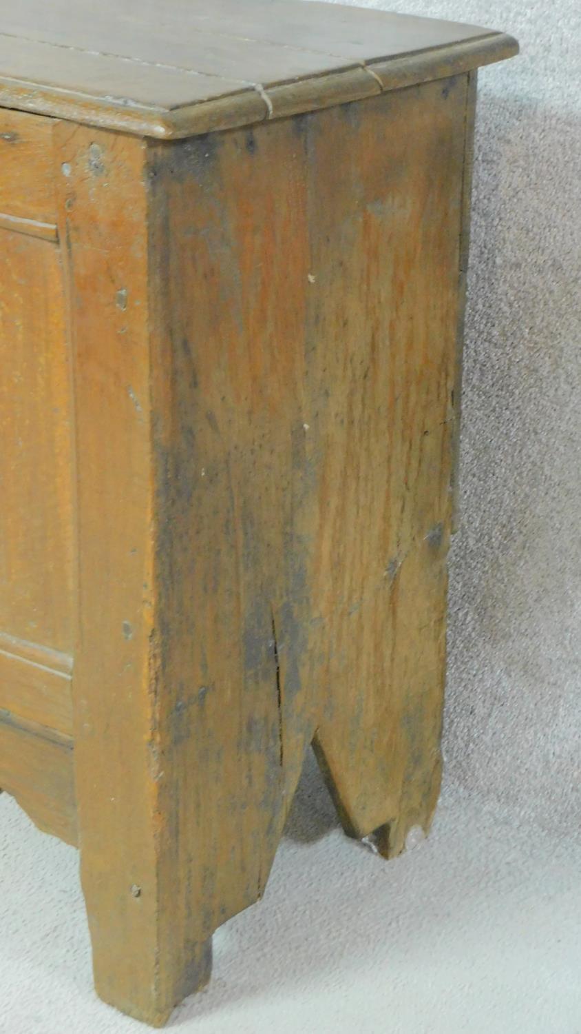 A Georgian country oak coffer with hinged top and panelled sides on block supports. H.73 W.122 D. - Image 6 of 6