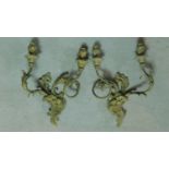 A pair of gilt metal Rococo style twin branch wall candelabras. H.40 W.28 (previously wired for