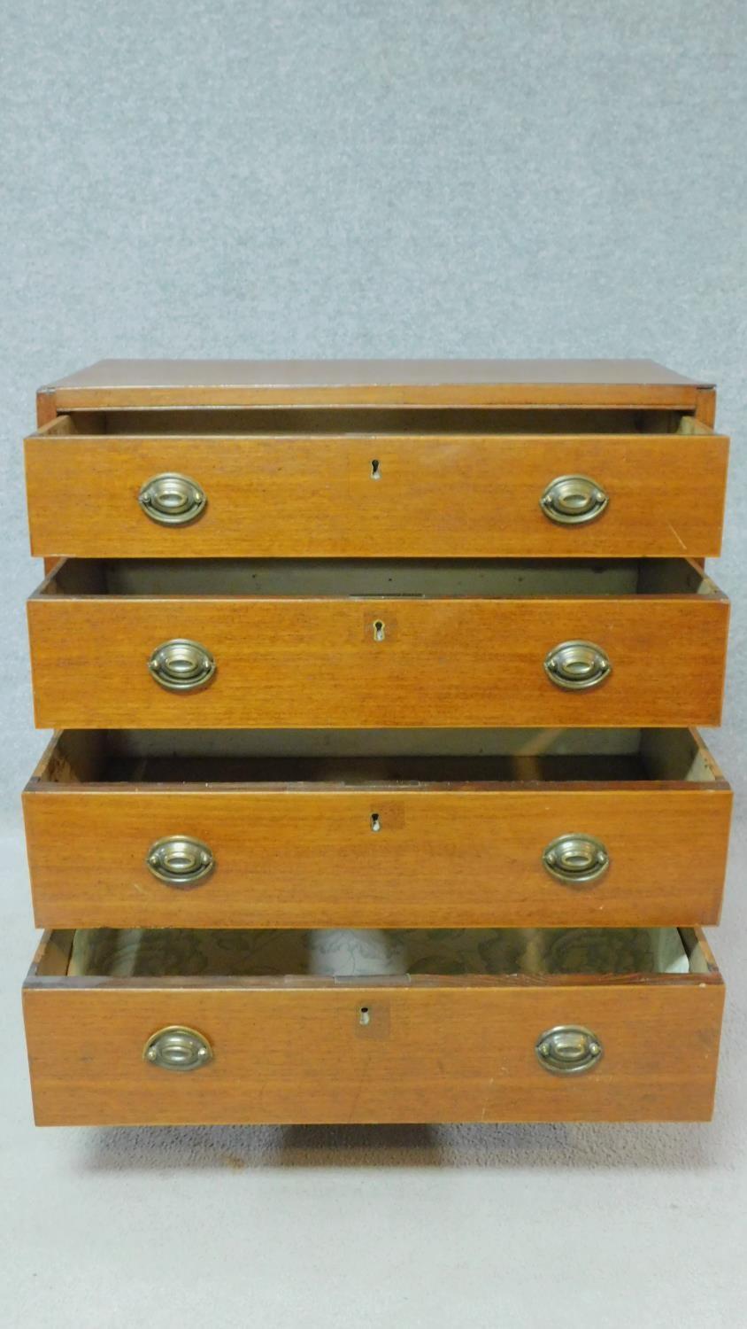 A Georgian mahogany chest of four graduating drawers of compact size on bracket feet. H.81 W.71 D. - Image 3 of 8