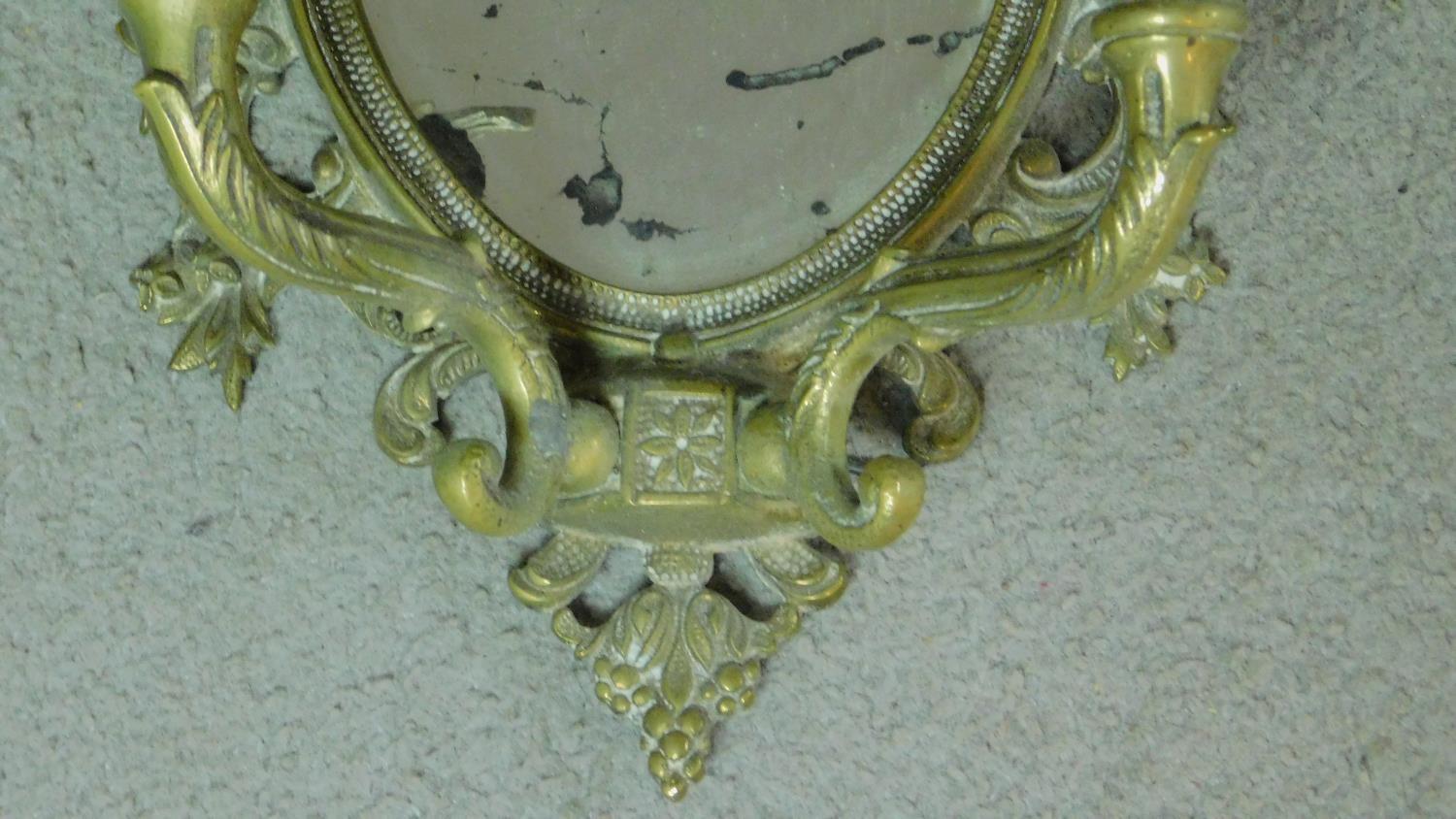 A pair of mid century vintage brass girandoles with twin branches, Rococo cresting and shaped glass. - Image 5 of 6