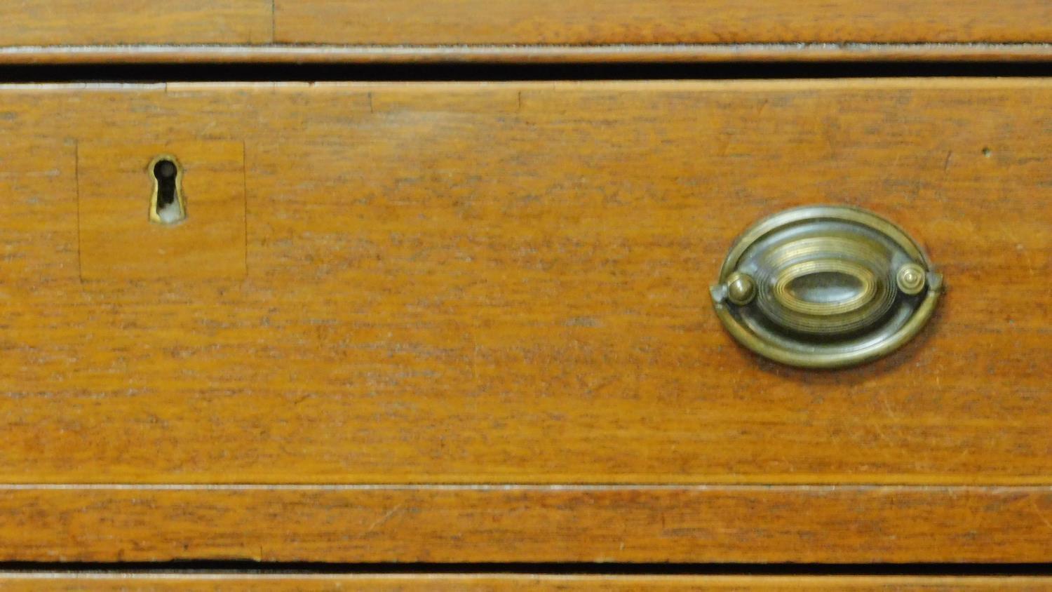 A Georgian mahogany chest of four graduating drawers of compact size on bracket feet. H.81 W.71 D. - Image 8 of 8