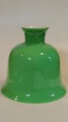 A vintage bell shaped opaque apple green blown glass ceiling pendant lampshade with white glass