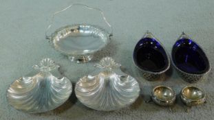 A pair of American Bellomark silver plated scallop shaped dishes from the cast of a Georgian dish,