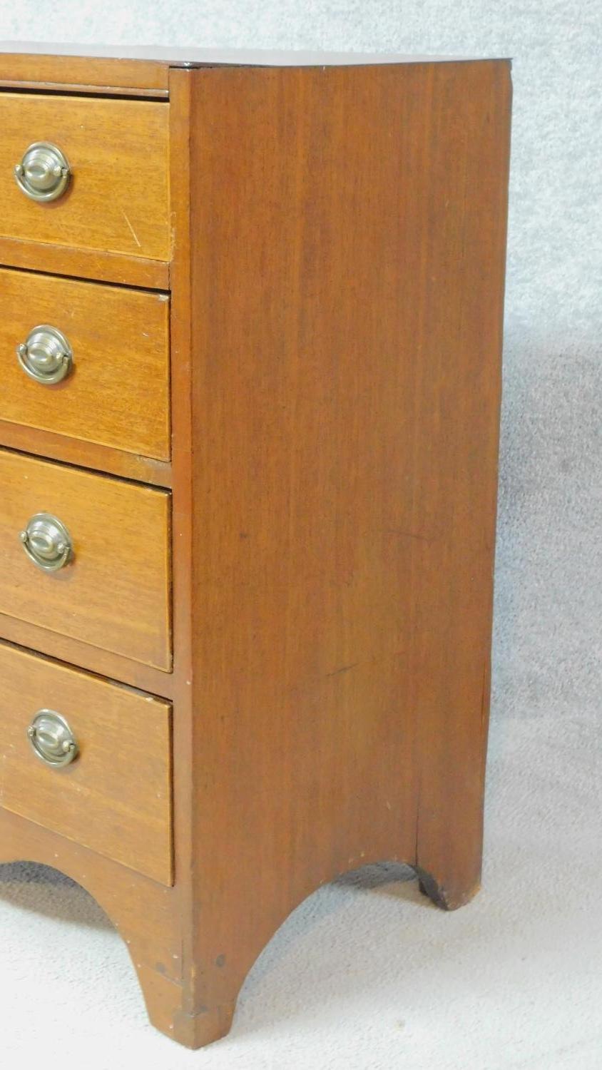 A Georgian mahogany chest of four graduating drawers of compact size on bracket feet. H.81 W.71 D. - Image 6 of 8