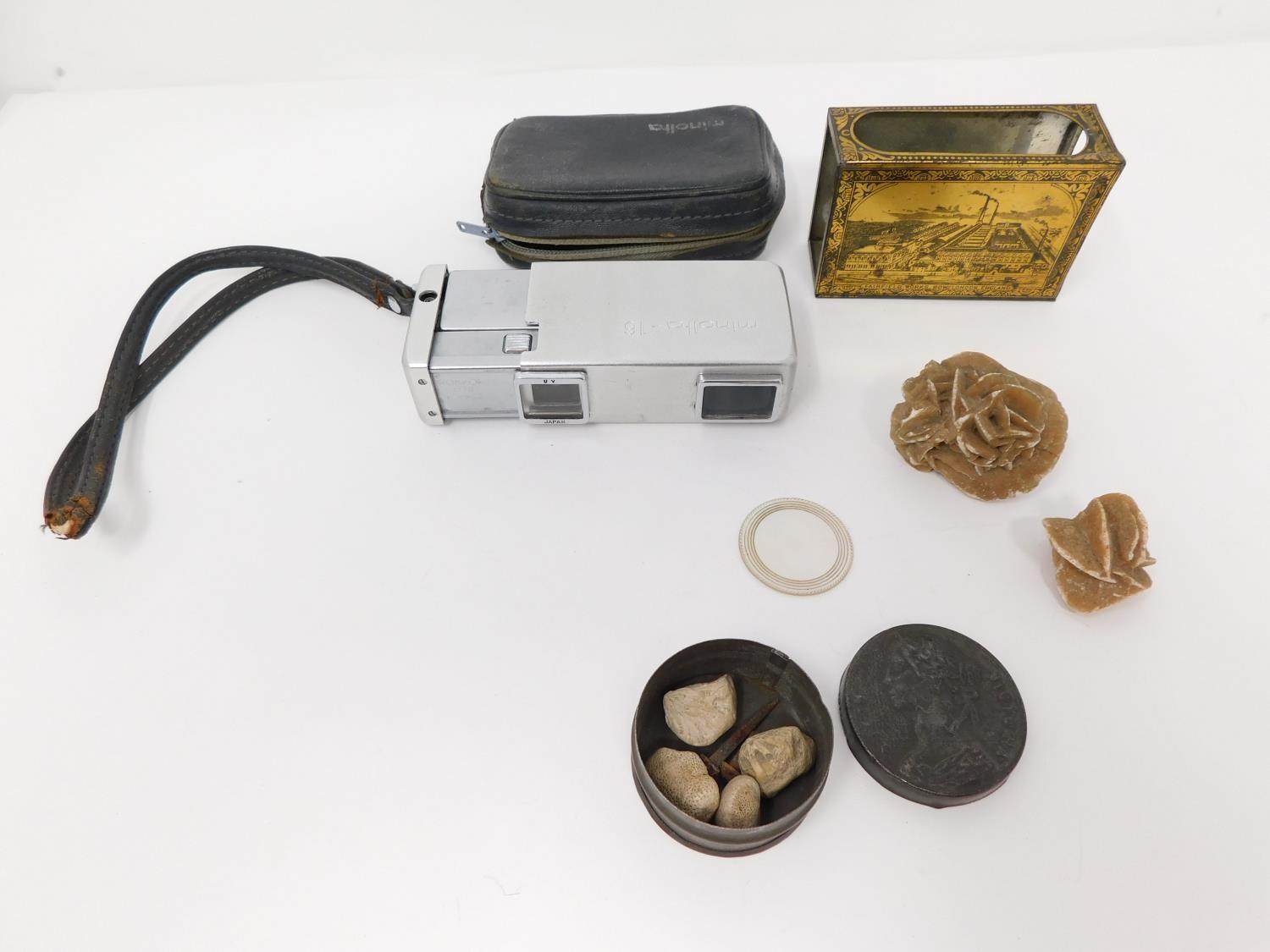 A collection of miscellaneous items. Including a vintage Japanese Minolta-16 Rokkor camera in