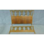 A Chippendale style mahogany triple chair back bedstead, H.109 W.160cm (lacks side bars)