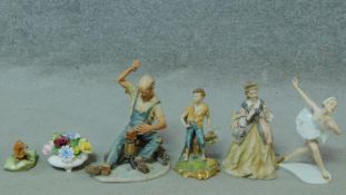 A collection of porcelain items. Inlcuding Noritake handpainted porcelain figures of a cobbler and a