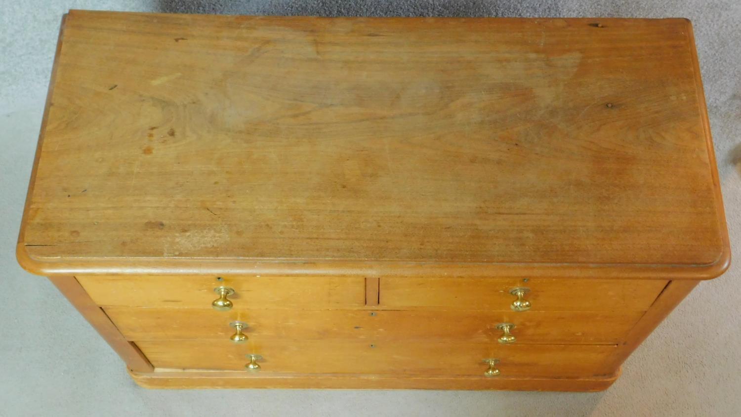 A Victorian pine chest of two short over two long drawers on plinth base. H.74 W.108 D.48cm - Image 3 of 5