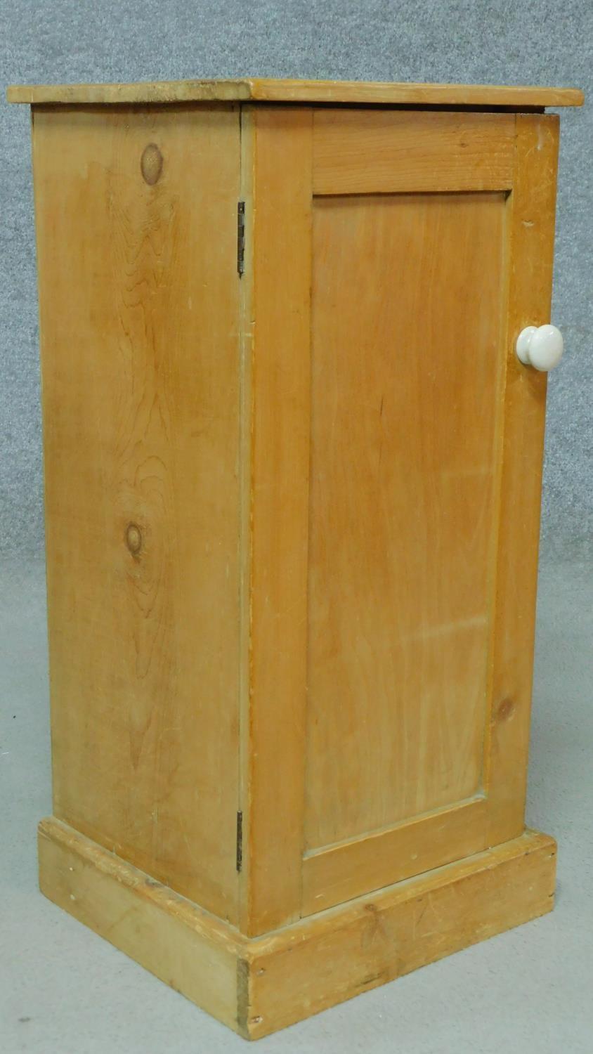 A 19th century pine bedside cabinet with shelved interior standing on plinth base. H.74 W.35 D.e4cm - Image 2 of 4