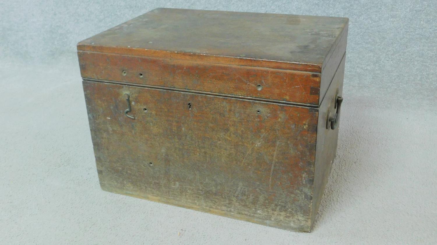 A small 19th century mahogany chest with twin brass carrying handles. H.34 W.48 D.34cm