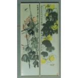 A pair of framed and glazed Japanese prints depicting flowers blossoming. 25x96cm