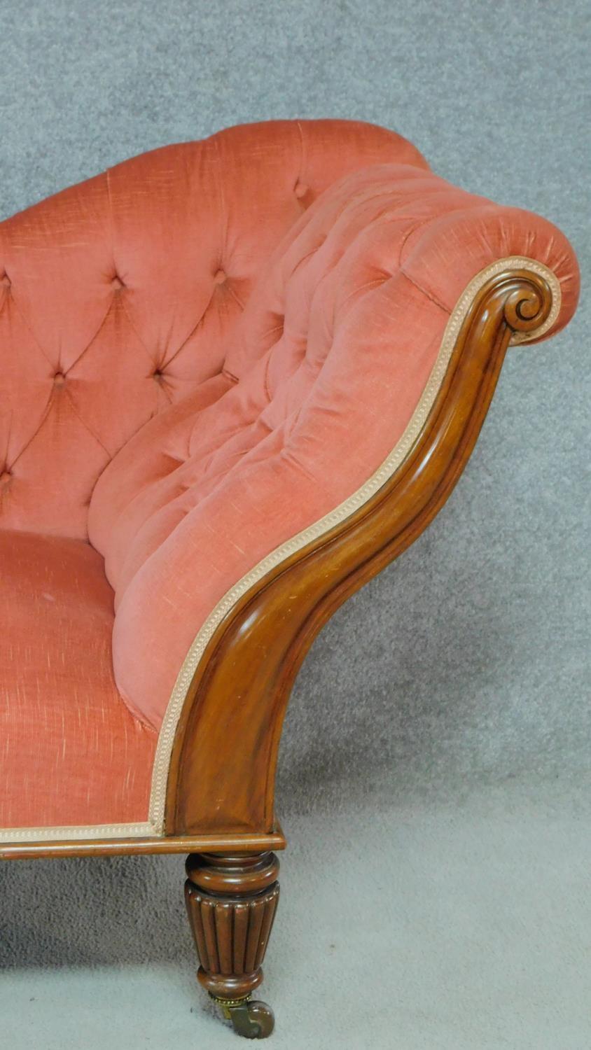 A Victorian carved mahogany framed chaise longue in deep buttoned blush velour upholstery raised - Image 2 of 4