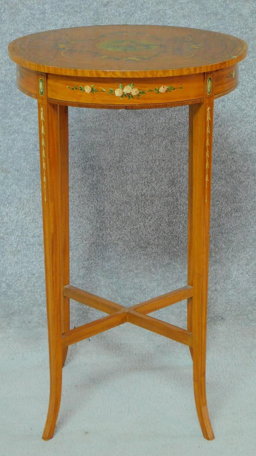 A late 19th century satinwood quarter veneered lamp table with rosewood crossbanding and Angelica