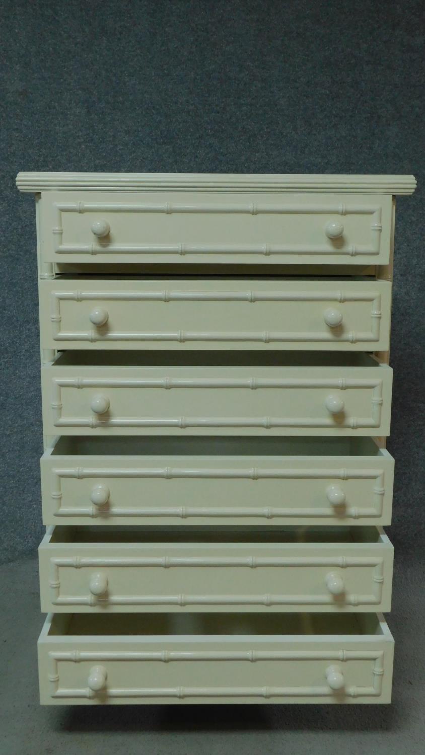 A contemporary white lacquered tallboy with faux bamboo design. H.111 W.80 D.47cm - Image 3 of 6