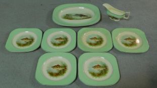 A Woods Ivory Ware Art Deco fish service with serving platter and sauce boat. Each piece with a