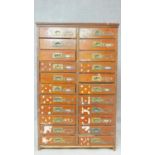 A late 19th century mahogany filing cabinet of twenty two drawers (in two banks of eleven) fitted