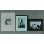 A framed and glazed black and white photograph, nude bathing study and two other framed and glazed