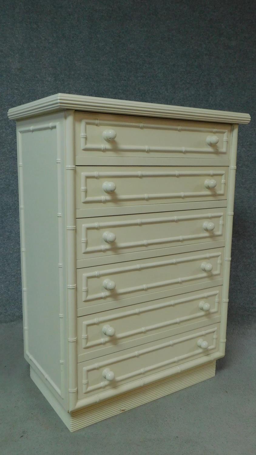 A contemporary white lacquered tallboy with faux bamboo design. H.111 W.80 D.47cm - Image 2 of 6